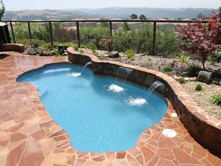 clear fiberglass pool with fountain